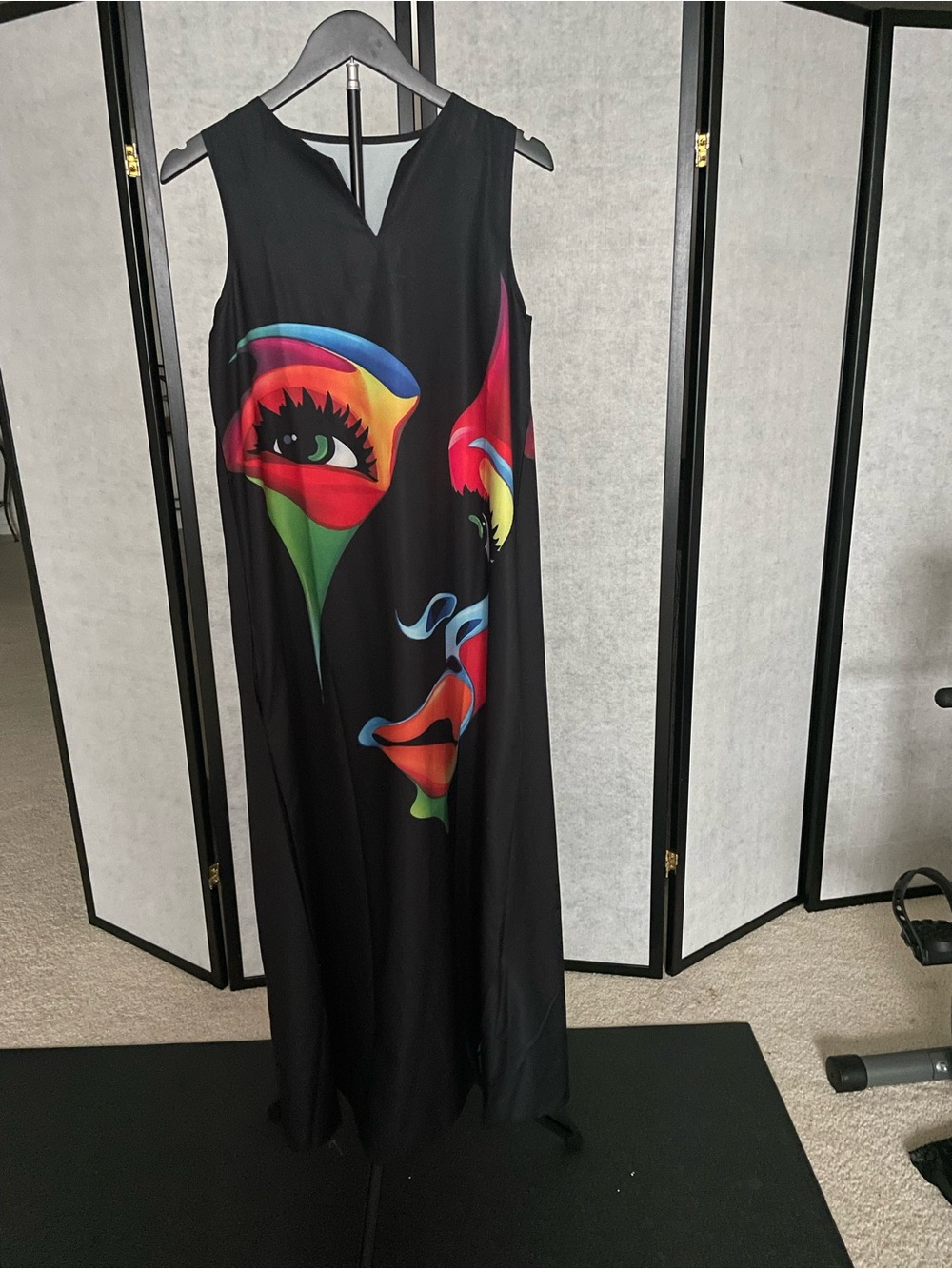 Sleeveless Black Maxi Dress with Vibrant Multicolor Face Print.
